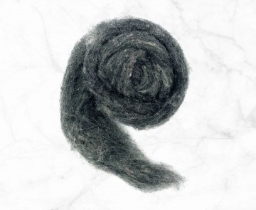 Natuurlijk donker grijze kaardvlies Cheviot in lont