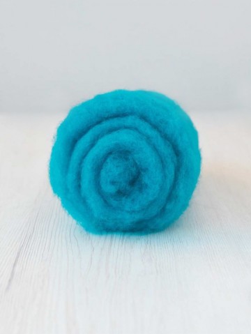 Gekaarde bergschaap in de kleur turquoise