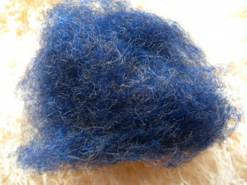 Gekaarde bergschaap in de kleur blauw-grijs