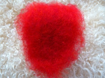 Gekaarde bergschaap in de kleur brique