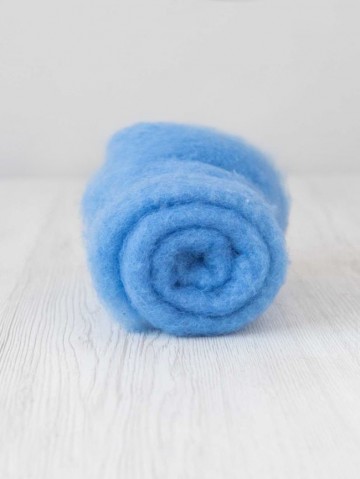 Gekaarde bergschaap in de kleur blauw