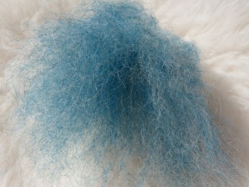 Gekaarde bergschaap in de kleur Licht Petrol