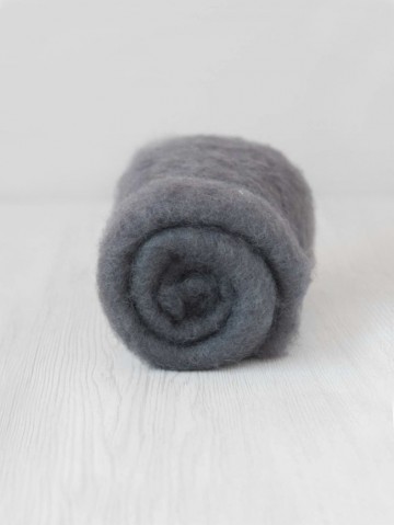 Gekaarde bergschaap in de kleur grijs